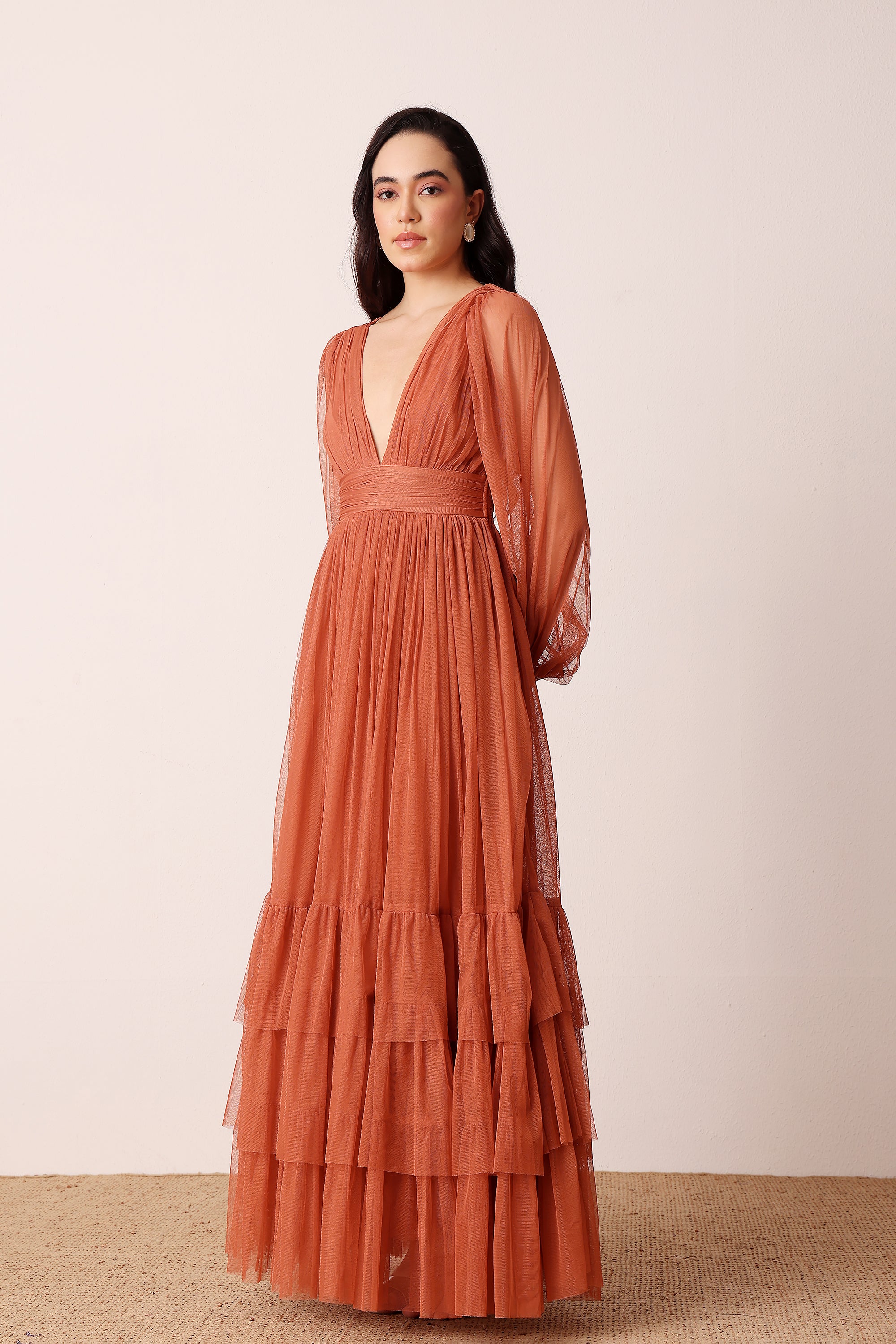 Long sleeve bridesmaid black tie wedding guest terracotta rose maxi dress