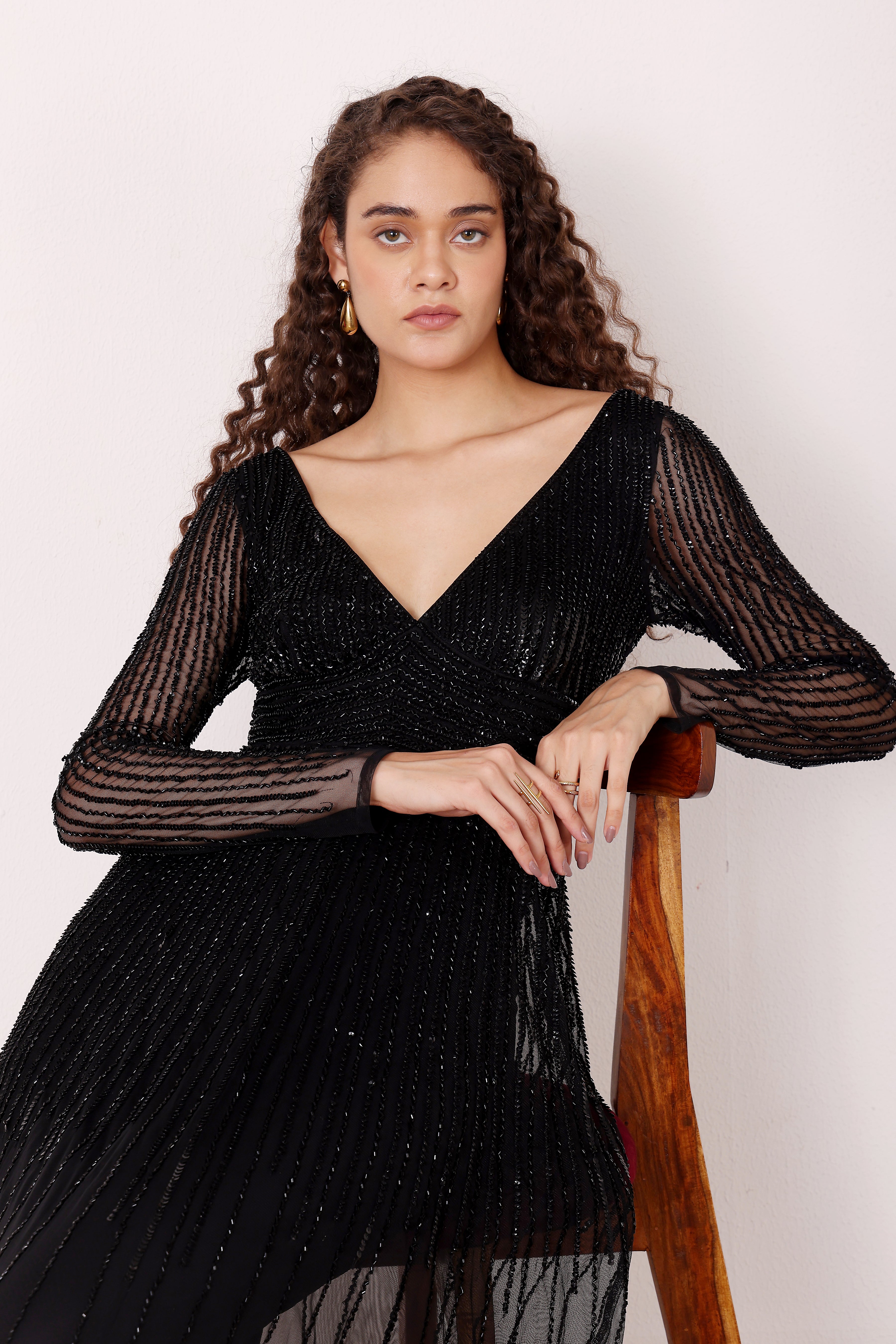 Embellished sequin beaded long sleeve plunging neckline black formal maxi dress